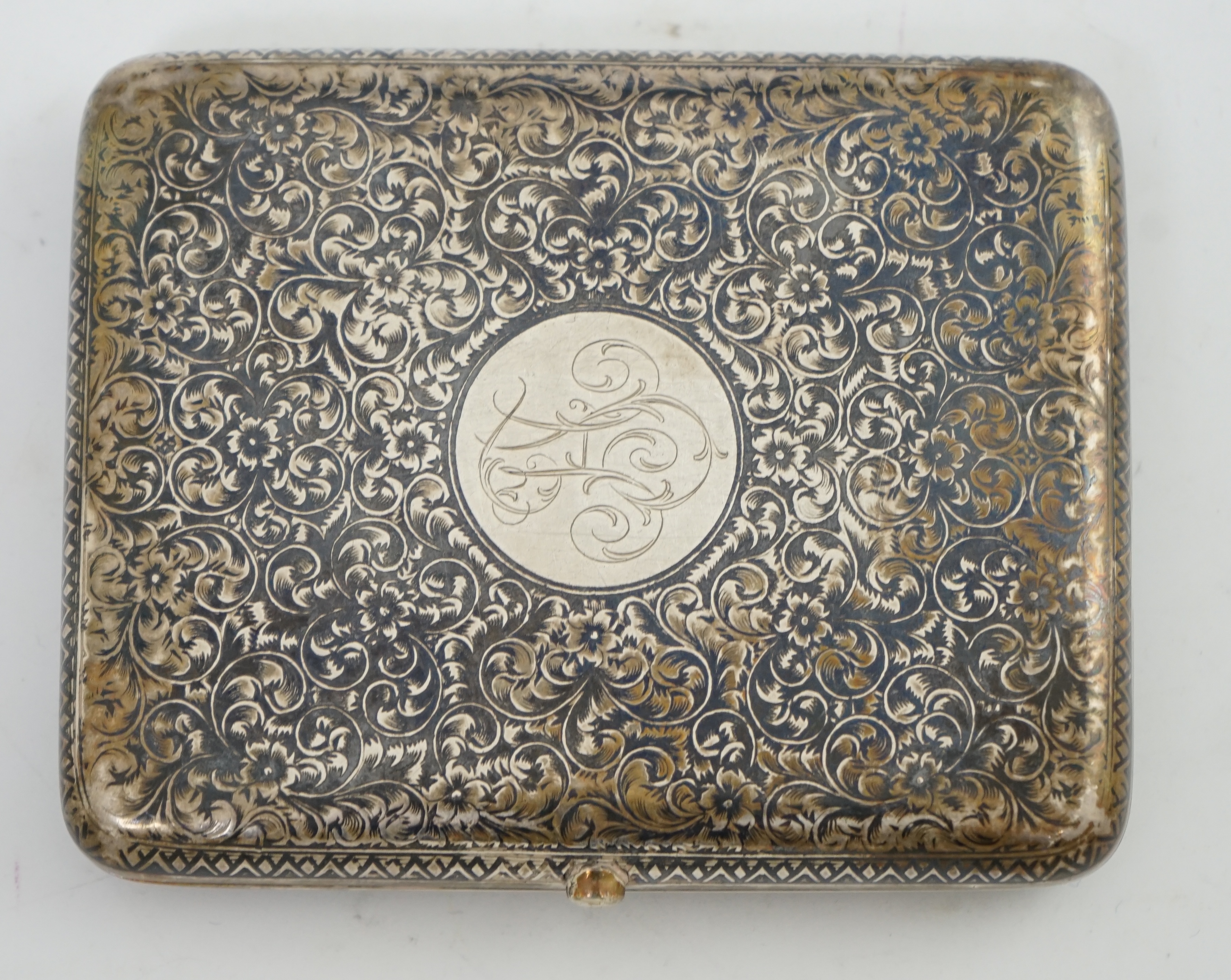 A late 19th century Russian 84 zolotnik silver and niello cigarette case